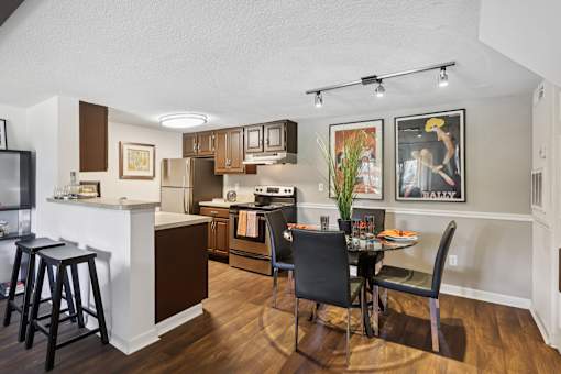 Kitchen with bar area at Whisper Lake Apartments, Winter Park