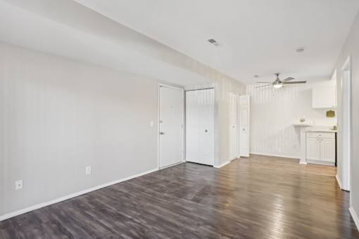 A room with a wooden floor and white walls.at Creve Coeur, Creve Coeur, MO
