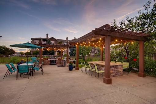 a patio with patio furniture and a pavilion with lights at Heritage at Stone Mountain, Northglenn, CO, 80233