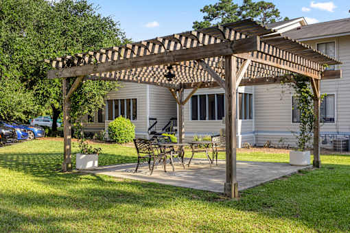 A wooden pergola at River Crossing Apartments, Georgia
