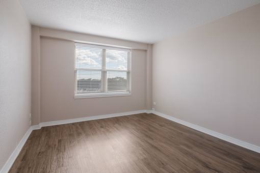 Bedroom with natural light and hardwood floors at Esplanade at City Park, New Orleans, LA, 70119
