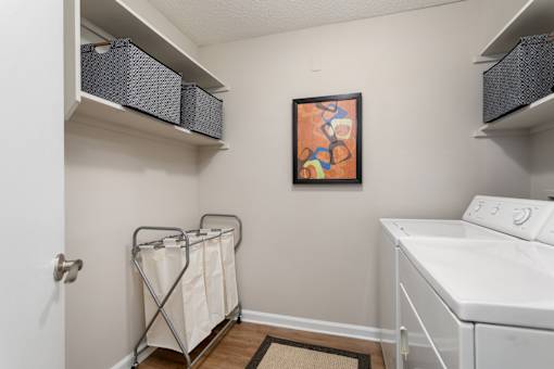 Laundry room with washer and dryer at University Ridge Apartments, Durham, NC, 27707