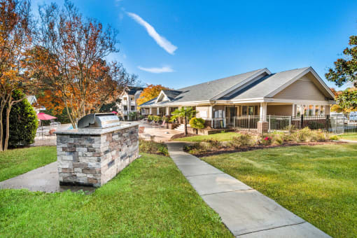Quaint Courtyard With Bbq Area at Cedar Springs Apartments, Raleigh, North Carolina