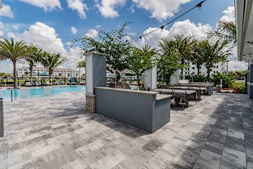 Poolside Grill and Picnic Tables at Edge75, Naples, Florida 34104