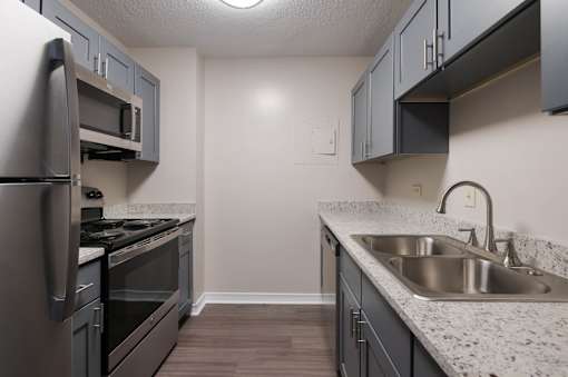 Kitchen with stainless steel appliances at Esplanade at City Park, Louisiana