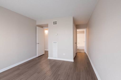 Bedroom with wooden floor at Esplanade at City Park, New Orleans, LA