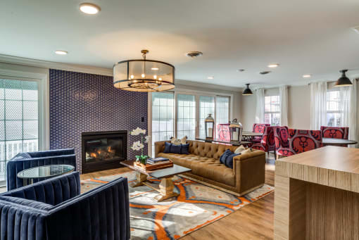 Clubroom With Fireplace at Heritage at the River, Manchester, NH