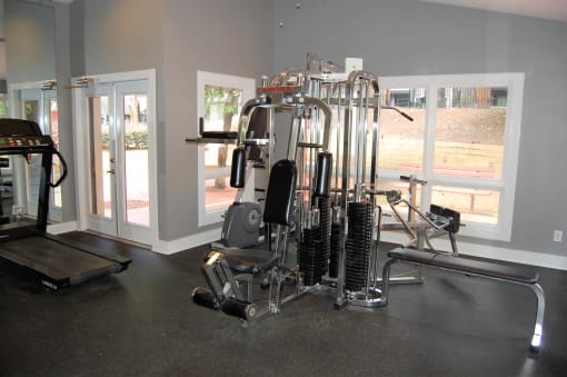 Fitness Center With Modern Equipment at The Pointe at Irving Park, Greensboro