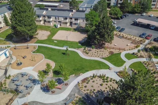 an aerial view of a park with a skate park at Spyglass Creek, Denver, 80224