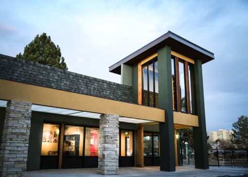 a view of the front of a building with glass door at Spyglass Creek, Denver, 80224