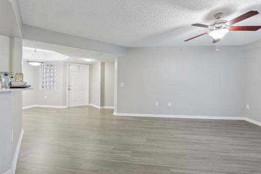 an empty living room with a ceiling fan at Pembroke Pines Landings, Pembroke Pines, FL 33025