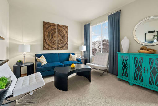 a living room with a blue couch