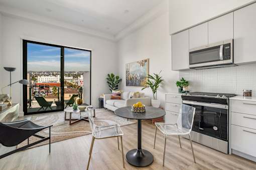 A modern kitchen with a view of the city at WM by CLG, Los Angeles California  