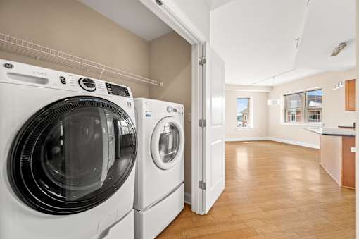 A laundry room with a washer and dryer.