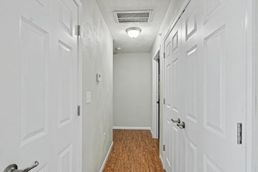 Northbrooke Commons hallway with white trim doors and door levers.