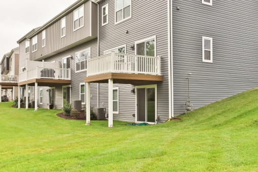 a home with a balcony on the side of it