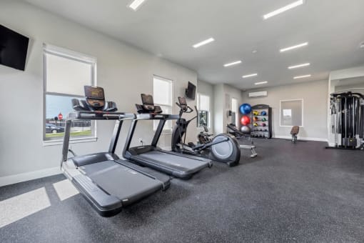 the gym at The Prairie Luxury Apartments, Dardenne Prairie, MO