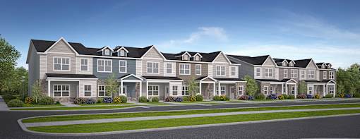 A row of houses with grey roofs at Montage at Hawk Ridge Apartments, Lake St. Louis, Missouri