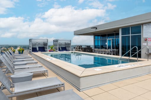 a swimming pool on the rooftop of a building at Two Twelve Clayton, Clayton, MO, 63105