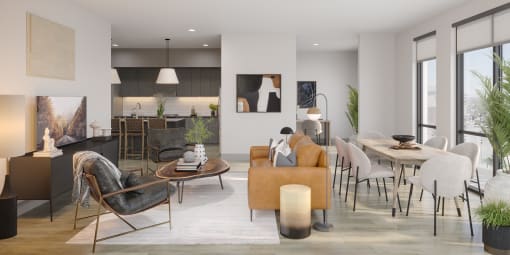 a living room and dining room with a table and chairs at Bemiston Place Apartments, Clayton, MO