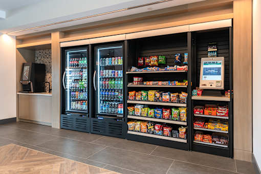 A vending machine with a variety of snacks and drinks.
