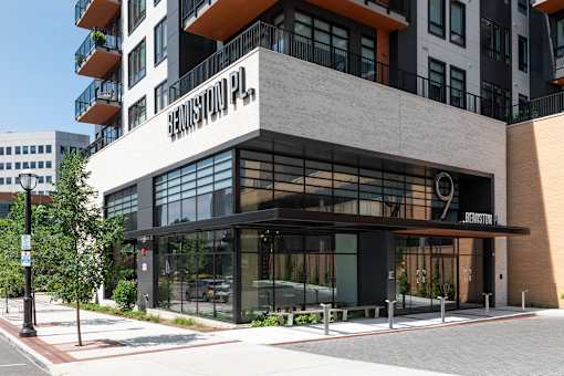 The exterior of a modern building with the name "BARRISTOWN PL" on it.