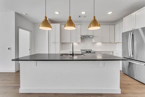 Kitchen with island at Plaza at Pinnacle Hills, Arkansas, 72758