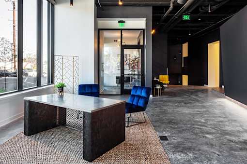 lobby with desk and seating at Steelcote Square, Missouri