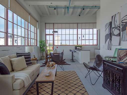 Steelcote Lofts living room with polished concrete flooring at Steelcote Square, St. Louis