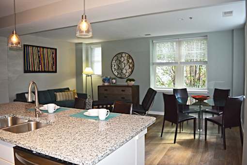 kitchen with dining table and four chairs at Residences at Forest Park, Saint Louis, Missouri
