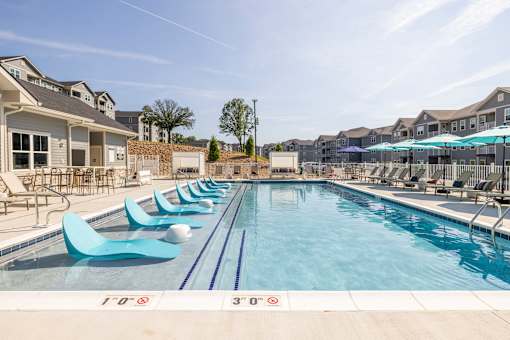 Pool With Relaxing Chairs at Preserve at Sycamore Creek, Osage Beach, MO 65065