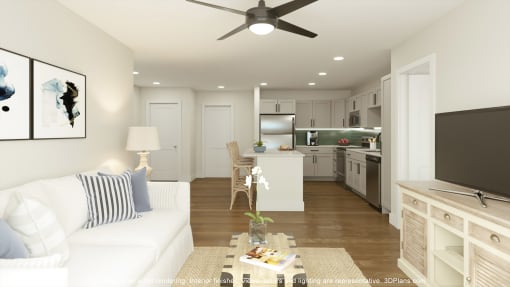 a living room and kitchen in an open floor plan at The Rail, St. Louis, 63110