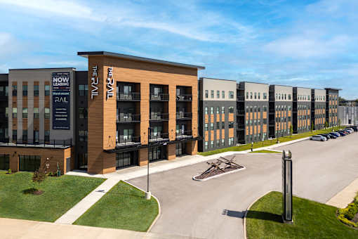 A modern building with a sign that says "The Pall" on it.