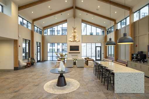 A large open space with a table and chairs in the center.