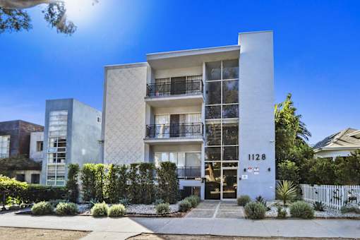 A modern building with the number 1128 on it.