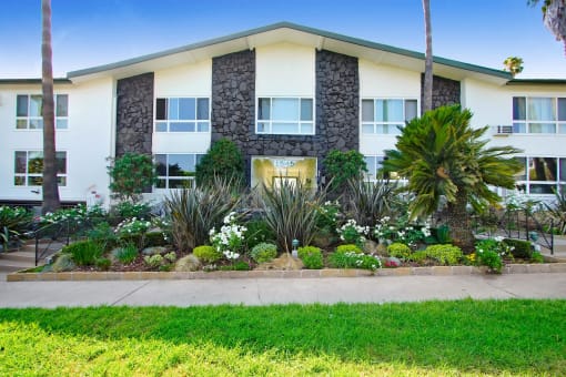 a house with a garden in front of it