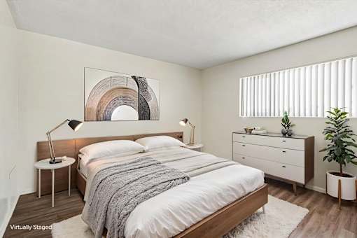 A bedroom with a large window