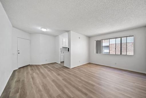 A room with a washer and dryer in it.
