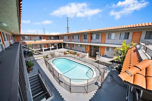 A view of a pool from a balcony.