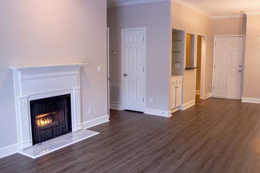 Living Room with Fireplace at Lenox Village Apartments, Atlanta, Georgia