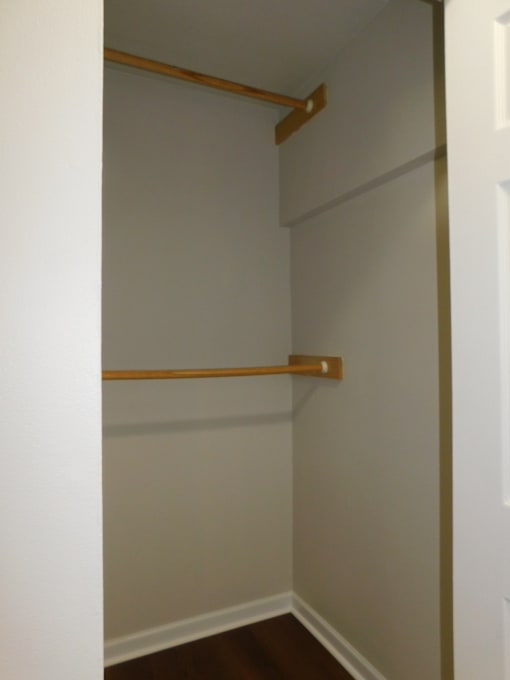 A white door with a brown handle.