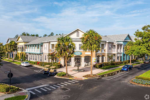 A street view of a building with a sign that reads "Cascade".