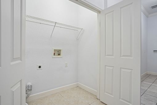A white door is on the right side of the image.