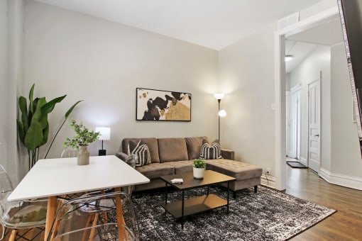 a living room with a couch and a table