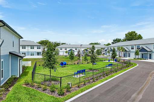 A residential area with houses and a playground.