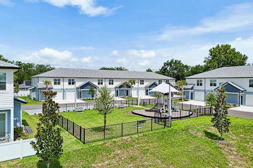 A residential area with houses and a playground.