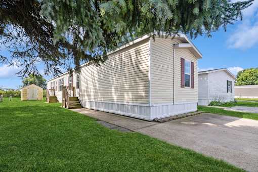 Exterior view of model home at Candlelight Village Manufactured Home Community in Sauk, IL