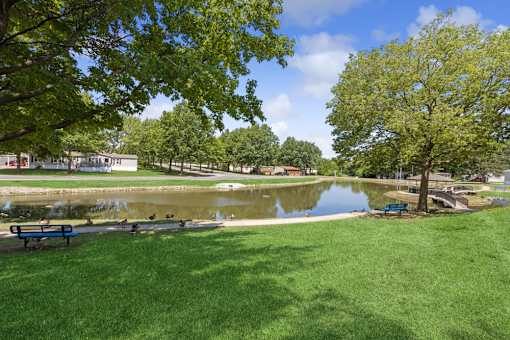 Private lake and greenscape at Southfork MHC in Belton, MO
