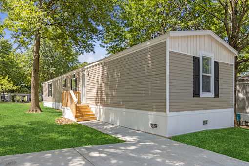 Model home exterior at Southfork MHC in Belton, MO