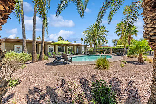 View of pool and landscaping at Verde Plaza Manufactured Home Community in Tucson, Arizona